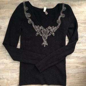 We the free sweater.